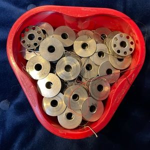 Vintage. 50 bobbins. Standard size fit ons singer and also fit my old kenmore